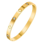 Load image into Gallery viewer, Gold bracelet with diamond accents on a white background