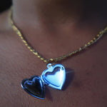 Load image into Gallery viewer, Necklace with heart-shaped pendants on a person&#39;s neck
