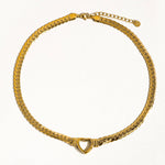 Load image into Gallery viewer, Gold chain necklace with a heart clasp on a white background
